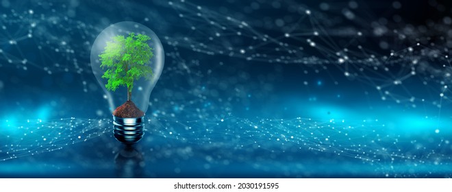 Tree growing on lightbulb with digital convergence and blue network technology background. Environmental Technology, Green Technology, Green Computer, IT ethics, Csr, and Free IT Concept.
