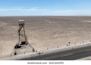 The Tree image of Nazca lines next to an old observation tower, Peru