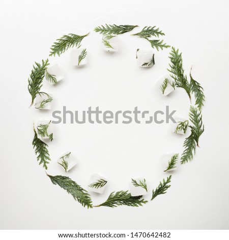 Similar – Green wreath with flowers and plants on white