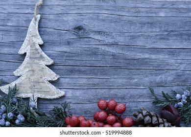 Tree shape Ornament with potpourri on wooden background