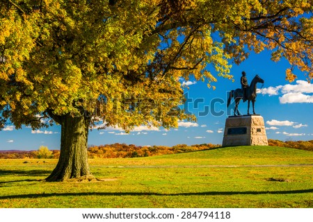 Tree and statue on a battlefield at Gettysburg, Pennsylvania.