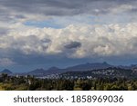 Trees and clouds on the hill.