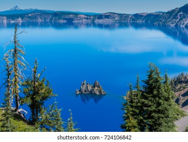 Trees Frame Phantom Ship Island In Crater Lake