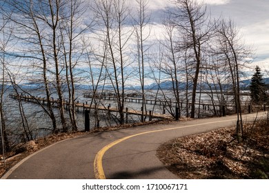 Trees And Piers At Side Of Lake Tahoe Road