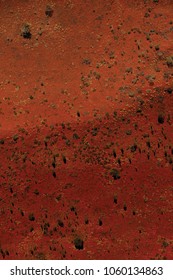 Trees And Shrubs Dot An Aerial Image Of The Red Sands Of The Australian Outback Desert.