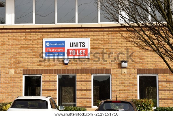 Treforest, Wales - February 2022: Sign on the\
outside of an office building advertising office space for rent.\
Working from home has had a significant impact on the office rental\
market.