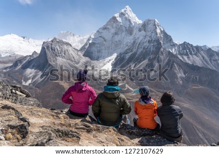 Trekker enjoy Ama Dablam mountain view from Nangkart Shank view point, Dingboche village, Nepal, Asia