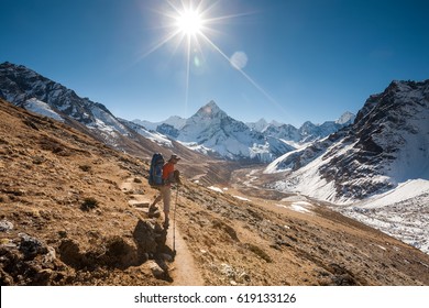 Trekker in Khumbu valley in front of Abadablan mount on a way to Everest Base camp