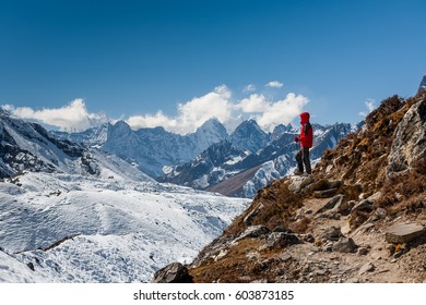 Trekker in Khumbu valley on a way to Everest Base camp - Shutterstock ID 603873185