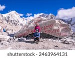 Trekkers posing at Everest Base Camp, Nepal.