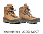 Trekking boots for hiking on a white background. Equipment for travel and hiking