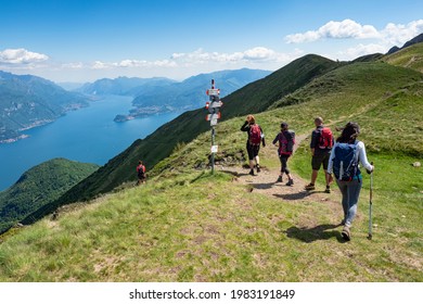 Trekking scene on Lake Como alps (the arrows indicates the names of the locations reached by the trails)