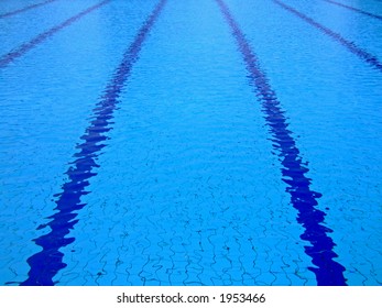 Trembling Surface Of An Olympic Size Swimming Pool