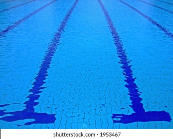 Trembling Surface Of An Olympic Size Swimming Pool