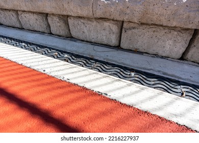 Trench Drain Along Outdoor Basketball Court At School Playground.  	