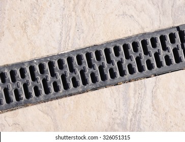 Trench Drain Linear Grate On Street Closeup 