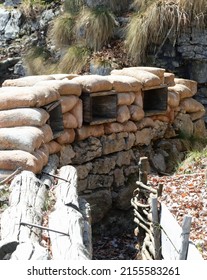 trench dug into the ground with piles of sandbags installed by army soldiers to defend against enemy attacks during the war