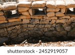 trench loophole on the war front line with many sandbags for army protection