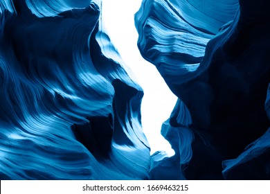 Trend color 2020 classic blue, top view, layout for design. Mountain texture in trendy blue color. Trendy color concept year, classic blue background. Lower Antelope Canyon travel to America, Arizona.