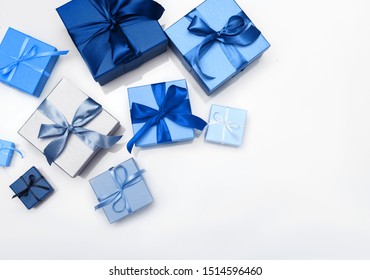 Trending New Color Classic Blue. Multi-colored Gift Boxes With Bow. Flatlay