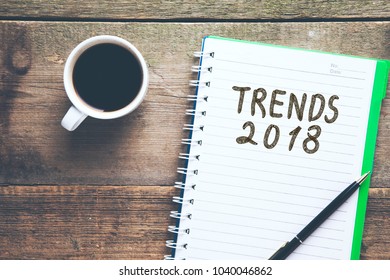 trends 2018 text on notepad on office desk - Shutterstock ID 1040046862