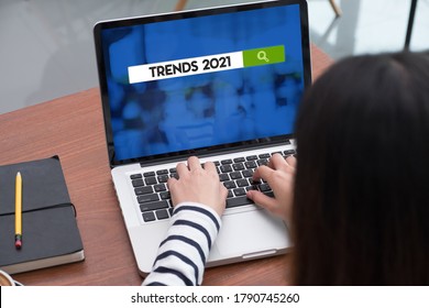 Trends For 2021 On Laptop Screen With Woman Type On Laptop,Digital Business Disruption Or Marketing Trending.digital Transformation