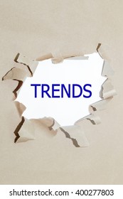 Trends Written Under Torn Paper