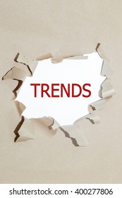 Trends Written Under Torn Paper