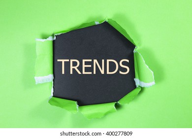 Trends Written Under Torn Paper