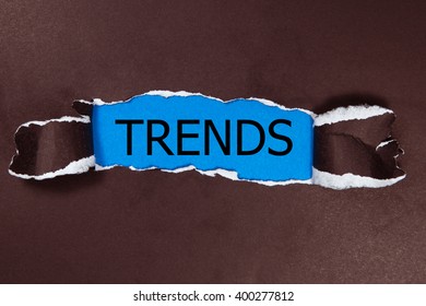 Trends Written Under Torn Paper