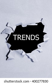 Trends Written Under Torn Paper