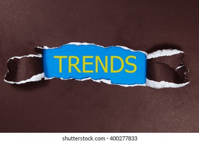 Trends Written Under Torn Paper