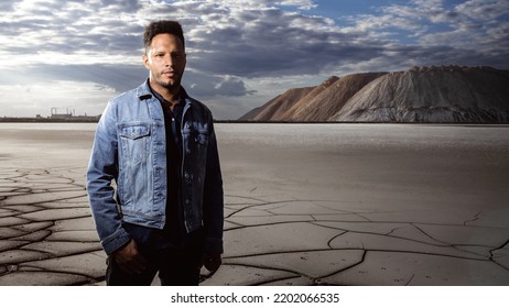 Trendy American Man Against Mountains In Stylish Classic Jean Jacket With Fashionable Hairstyle Handsome Man Model Portrait Fashion Concept Mens Clothing