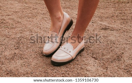 Trendy beige feminine loafers. Women's shoes