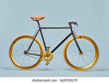 bicycle rider back gold