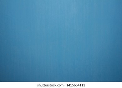 Trendy blue color background. Sea color pattern, wall for image inserting. Studio light blue background for designers. Wall, wallpaper and surface texture. 