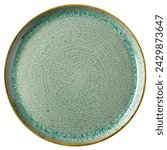 Trendy Circle Pastel Pale Green sand grain texture handmade Ceramic Dish plate, top view stoneware plate isolated white. 