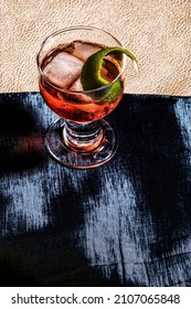 Trendy Cocktail With Lime In A Party With Vibrant Color Background