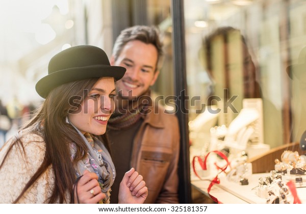 Trendy Couple Looking Engagement Rings Grey Stock Photo