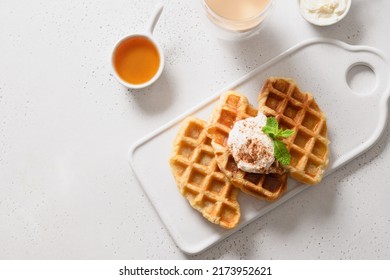 Trendy Croffles For Delicious Breakfast With Maple Syrup On White Background. View From Above. Copy Space. Croissant Waffle.