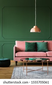 Trendy Green Living Room With Pink Velvet Sofa