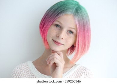Trendy hairstyle concept  Girl and colorful dyed hair white background