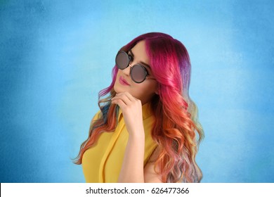 Trendy Hairstyle Concept. Young Woman With Colorful Dyed Hair On Color Background