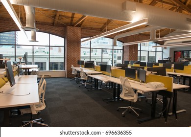 Trendy Modern Open Concept Loft Office Space With Big Windows, Natural Light And A Layout To Encourage Collaboration, Creativity And Innovation