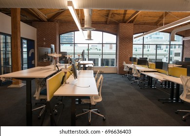 Trendy Modern Open Concept Loft Office Space With Big Windows, Natural Light And A Layout To Encourage Collaboration, Creativity And Innovation