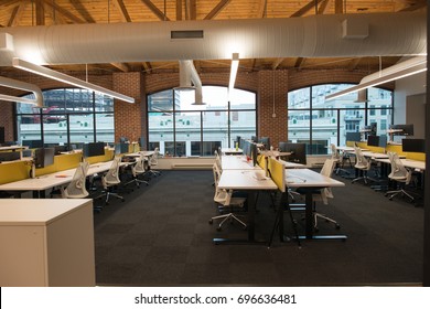 Trendy Modern Open Concept Loft Office Space With Big Windows, Natural Light And A Layout To Encourage Collaboration, Creativity And Innovation