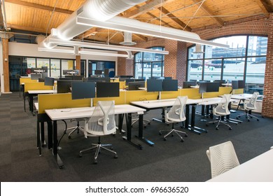 Trendy Modern Open Concept Loft Office Space With Big Windows, Natural Light And A Layout To Encourage Collaboration, Creativity And Innovation