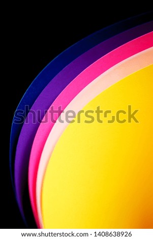 Trendy multicolor background from a cardboard of different neon colors. Copy space. Creative minimal back to school concept. 
