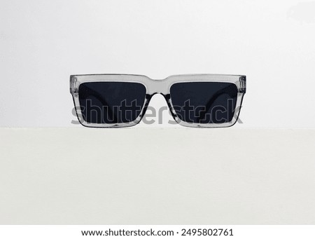 Trendy rectangular sunglasses isolated on white background. Modern and funky sunglasses design.