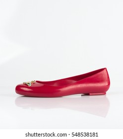 Trendy Red Ballet Shoes Shot On Plain Background